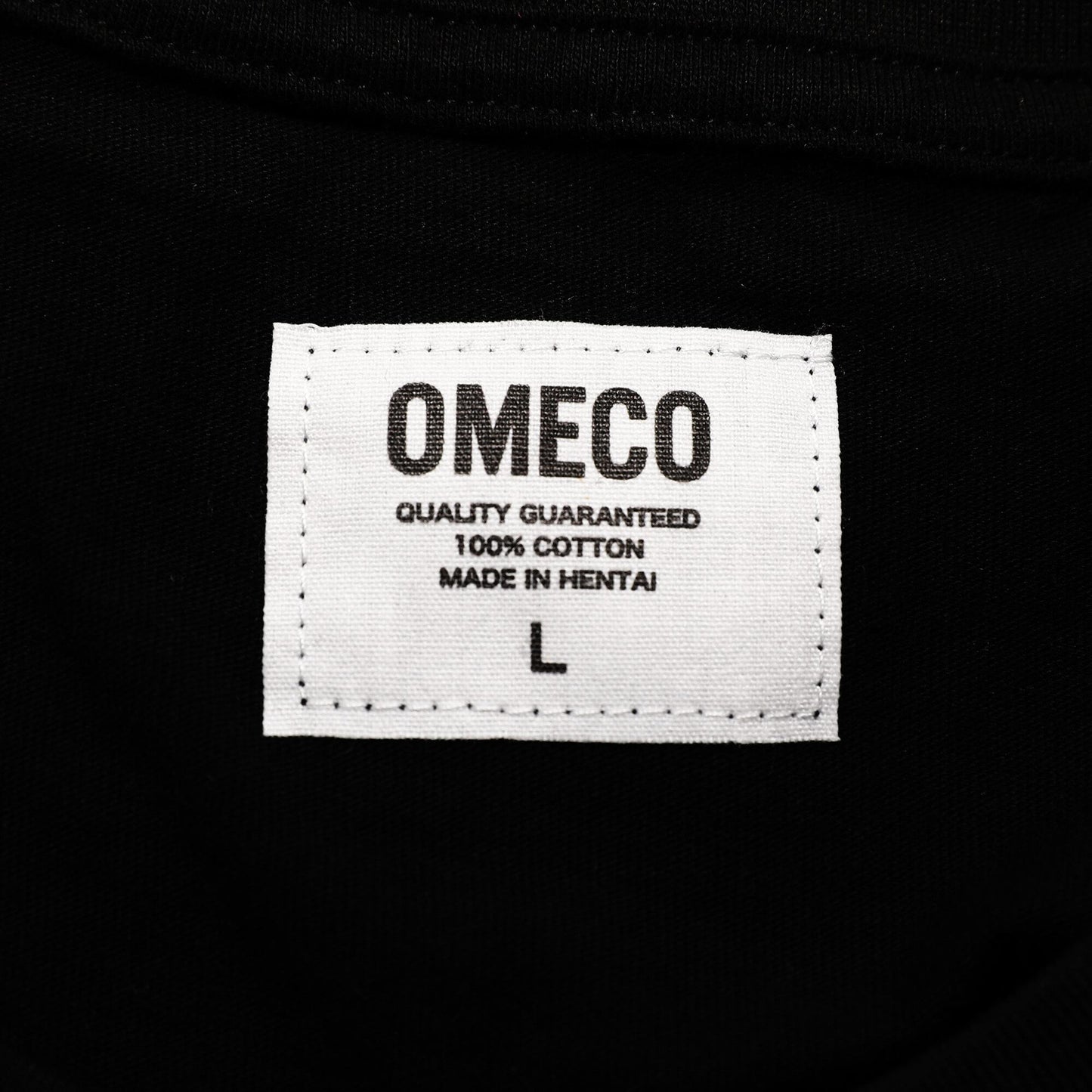 OMECO スプレーロゴ Tシャツ